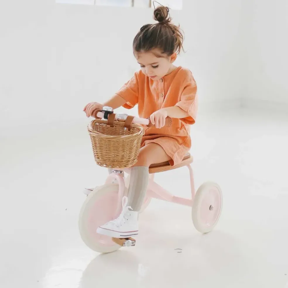 Tricycle vintage en métal rose Banwood